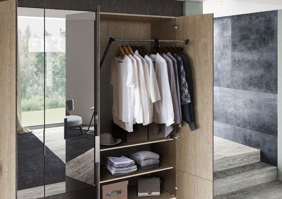 A closet with clothes in it

Description automatically generated
