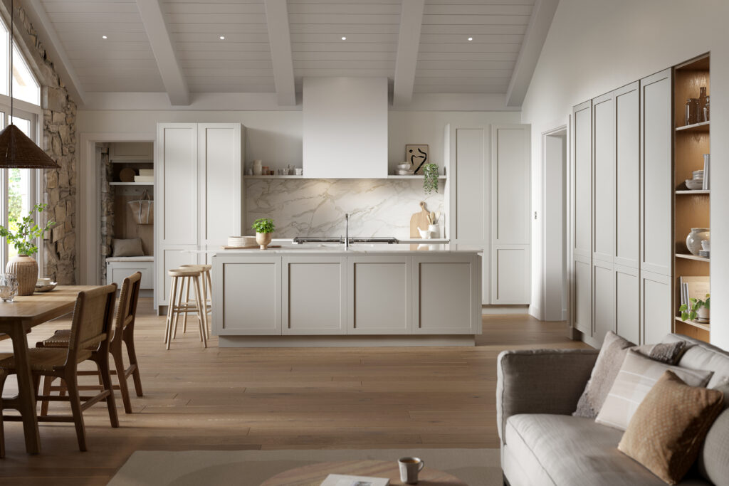 Open dining area under high ceilings with rustic table and cozy vibes - Ashford Kitchens & Interiors