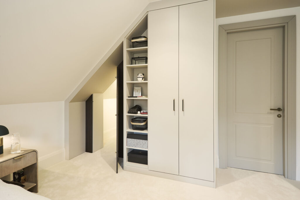 well-organized_bedroom_showcasing_wardrobe-Ashford_kitchens_and_interiors