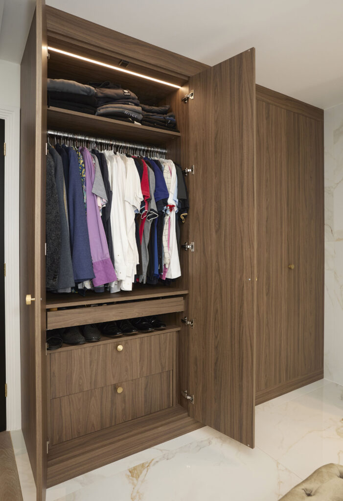 closet_filled_with_various_clothes-Ashford_kitchens_and_interiors