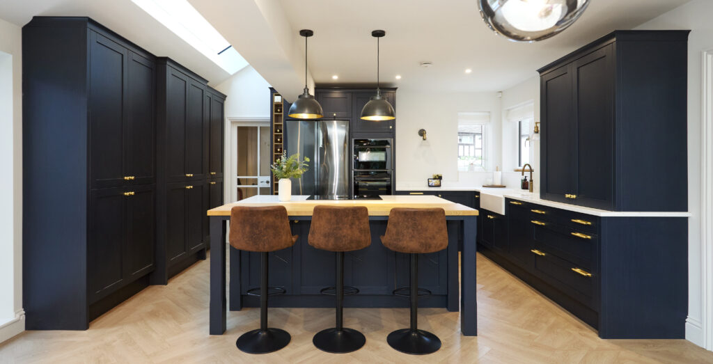 modern_kitchen_featuring_dark_blue_cabinets-Ashford_kitchens_and_interiors